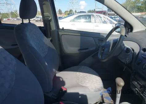 2002 Toyota Echo z USA, uszkodzony, nr VIN JTDBT123X20244240